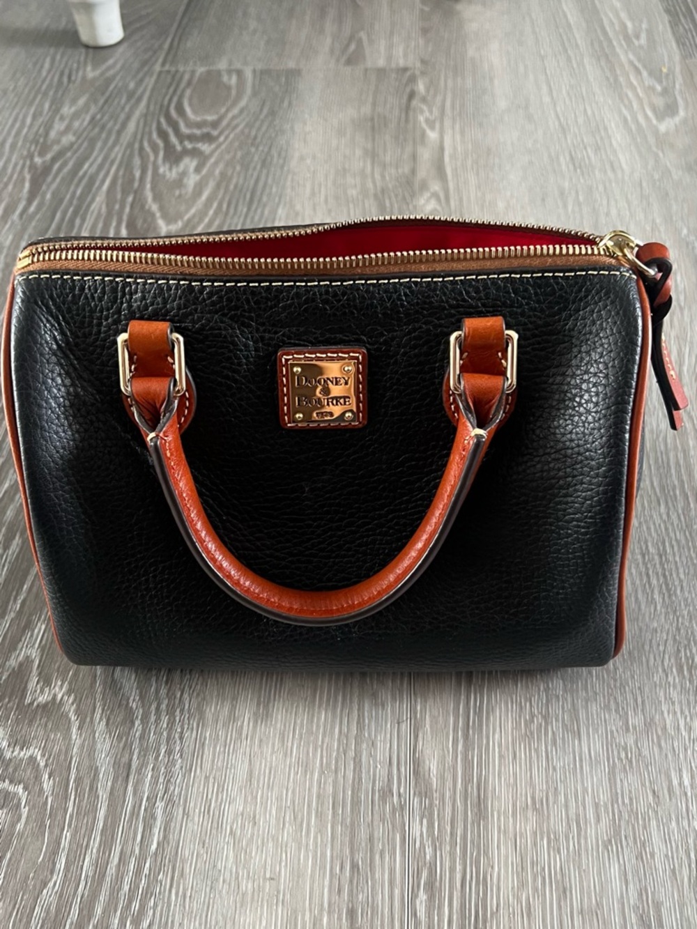 Dooney & Bourke Black Leather Satchel with Brown Trim